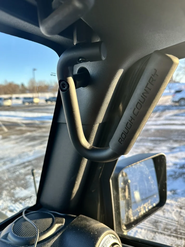 Rough Country grab handle installed on the black 2007 two-door JK